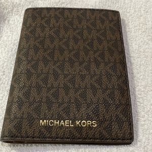 Michael Kors Brown Monogram Passport Wallet with Gold Logo